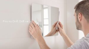 coller sur un miroir